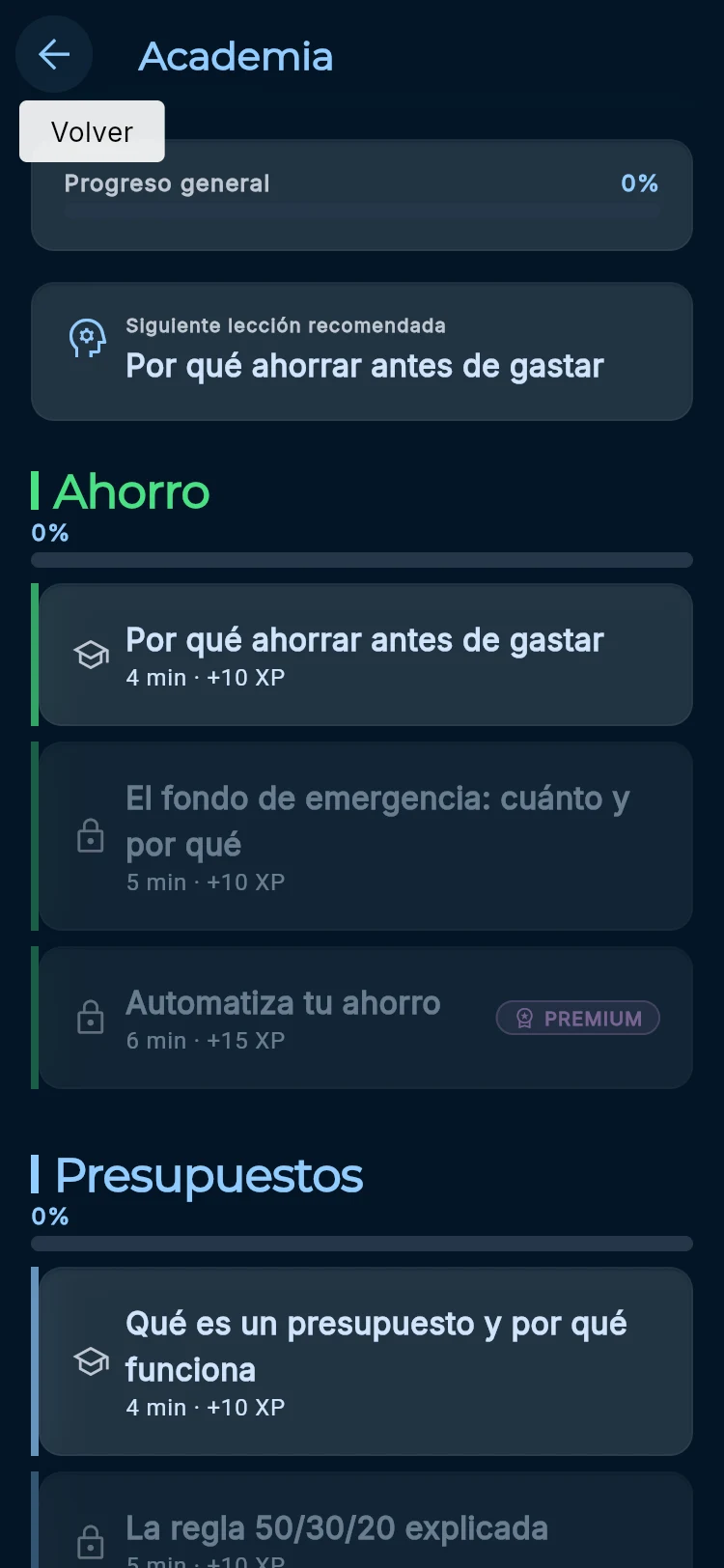 Captura de la Academia con lecciones organizadas por categorías, XP y desbloqueo secuencial